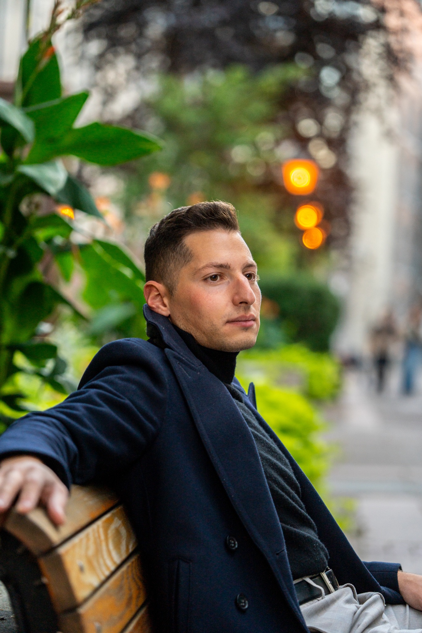 Portrait of Naim seated outdoors